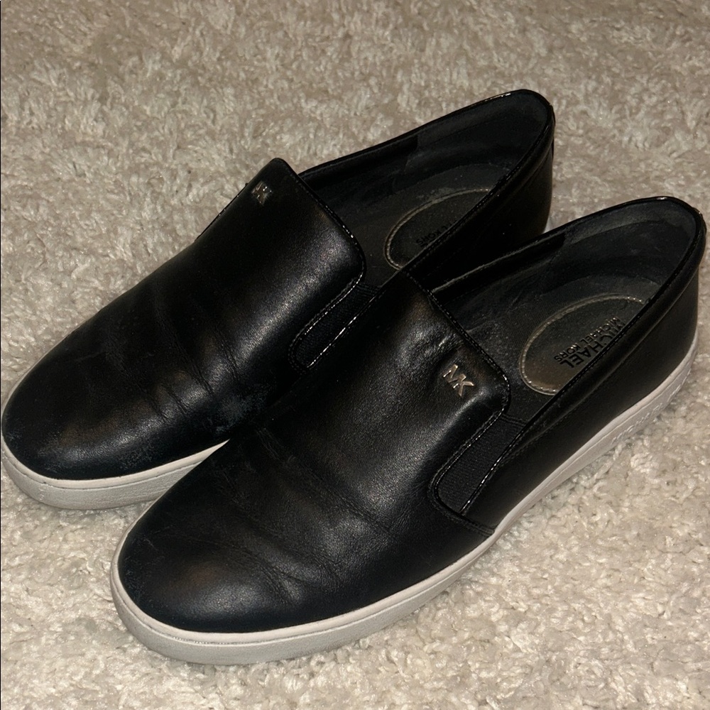 Michael Kors black slip ons
